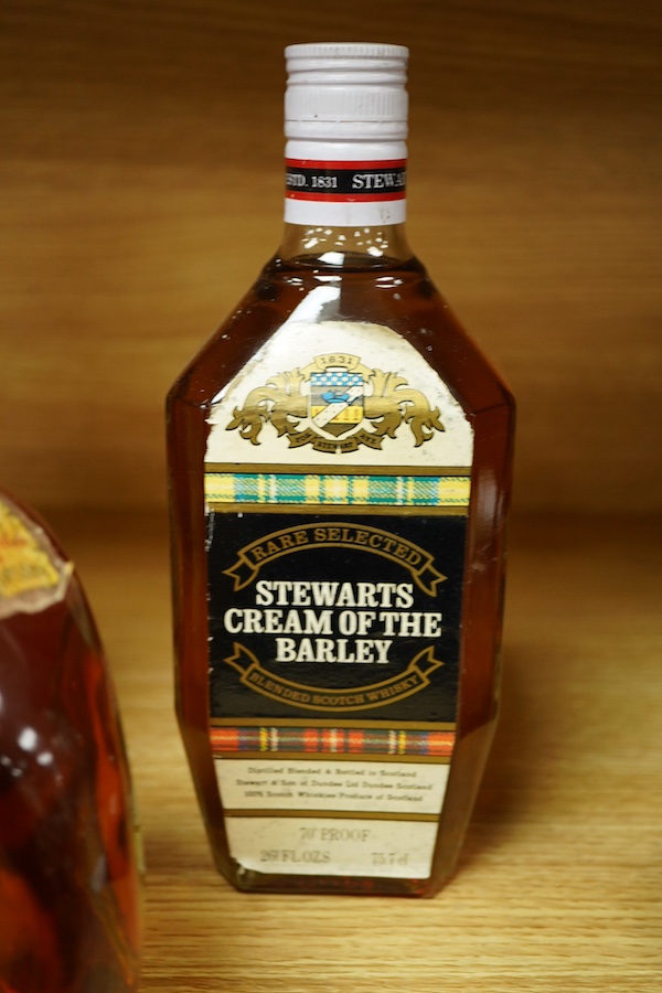 A bottle of Dimple whisky, Old Grand-Dad Bourbon whiskey and Stewarts Cream of the Barley